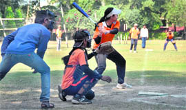 Players in action during a baseball match in Ludhiana on Sunday.