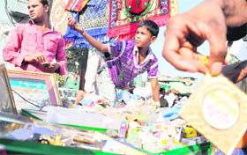 A boy sells a locket