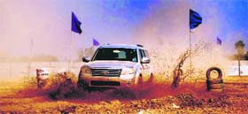 Tokyo drift: A car zips through a dirt track