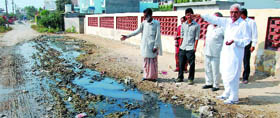 Residents of the Model Town phase-II show sewage flowing out of a vacant and unsold plot.