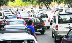 Cars stuck in a traffic jam at Sector 17 in Chandigarh on Monday.