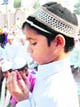 A young devotee offers Id prayers in Haridwar
