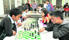 A match under way in the HNB Garhwal University Inter-college Chess Tournament in Dehradun