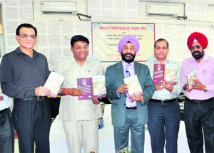 Dignitaries release the Punjabi poetry book, Pani Labhan Darya, authored by Gurbux Singh Saini at a function at Akademy Bhavan in Panchkula