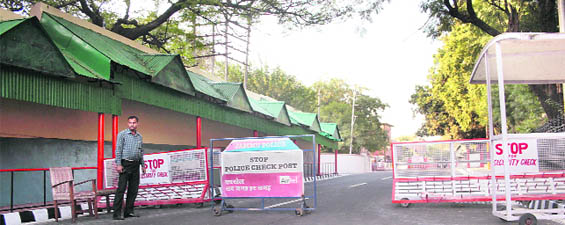 Barricades put up by the police on a road leading to the civil secretariat in Jammu. 