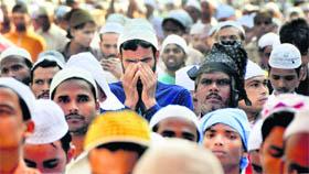 Devotees offer prayers on Eid-ul-Zuha outside Jama Masjid at Field Ganj in Ludhiana on Monday.