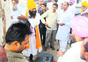 A quack sells medicines to patients near the Civil Hospital, Jagraon.