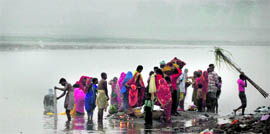 Devotees offer prayers at Chatt Puja in Ludhiana.