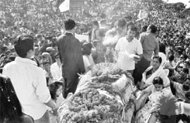 Thousands of fans gather to pay their respect to music maestro Bhupen Hazarika after his body was brought from Mumbai to Guwahati on Monday. 