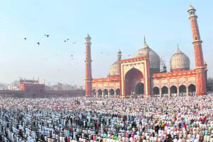 Muslims offer Eid prayers at the Jama Masjid in New Delhi on Monday.