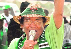 Liberian incumbent President Ellen Johnson Sirleaf gives a speech during a campaign meeting in Monrovia
