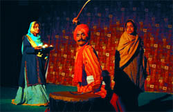 A scene from the play 'Dhamak Nagade Di' written by Gursharan Singh at the Balwant Gargi Open Air Theatre in Bathinda on Tuesday. The play was directed by noted playwright Kewal Dhaliwal