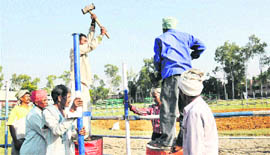 Workers busy making preparations for Dangal in Chandigarh on Tuesday.