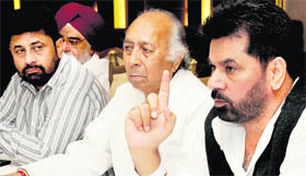 Chandigarh Congress president BB Behl and other local unit leaders address a press conference in Chandigarh on Tuesday.