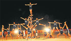 Policemen perform acrobatics as part of Police Week celebrations in Chandigarh on Tuesday.