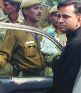 Policemen nab BJP actvist Sunil Goel for trying to commit suicide outside Arun Jaitleys house in New Delhi on Tuesday