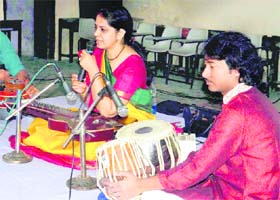 Dr Kamala Shankar, a guitarist, performs at a programme at Hindu National College in Dehradun on Tuesday