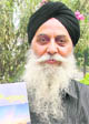 Writer Tara Singh Aalam with his book Rabb De Darshan during a release function in Ludhiana 