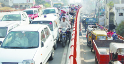 A view of the long queues of vehicles stranded at Bhandari bridge in Amritsar on Wednesday.