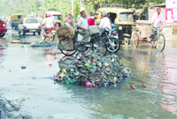 Sewage accumulated on the road at Nawankot area in Amritsar . 