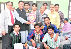 The winners of the Inter-college Chess Tournament of Hemwati Nandan Bahuguna Garhwal University at a function in Dehradun