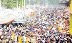 Devotees return to their respective destinations as the Gayatri Parivar festival ended a day ahead of its scheduled culmnation, in Haridwar