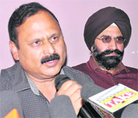 BJP leader Ram kumar Gupta addresses mediapersons in Jammu on Wednesday