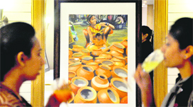 Spectators at an art exhibition by an artist at a hotel in Ludhiana, on Monday.
