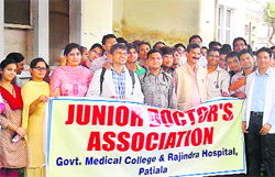 Members of Junior Doctors Association holding a protest in support of their demands at Government Rajindra hospital in Patiala on Wednesday. 