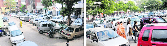 Vehicles parked along a road in Sector 22.