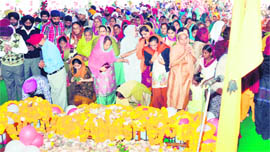 Sikh devotees pay obeisance at the Race Course gurdwara in Dehradun on Thursday.