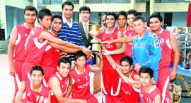 The Hilton School basketball team with the AC Deb Memorial Invitational Basketball Tournament trophy in Dehradun on Thursday.