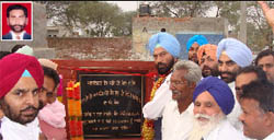 (Inset) file photo of constable Desha Singh; Rana Gurmeet Singh Sodhi, MLA, laying foundation stone of a memorial gate of Desha Singh at his native village Middha in Ferozpur