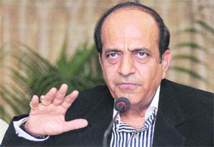 Railway Minister Dinesh Trivedi addressing a press conference in New Delhi on Friday.