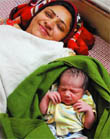 The mother and her baby girl that was born precisely at 11:11 am at the Ketaki Hospital in Veer Colony
