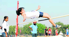 An athlete takes part in high jump at Panjab University in Chandigarh on Friday.