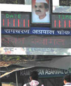 The digital watch at a traffic intersection in New Delhi shows Fridays auspicious date, 11.11.11.