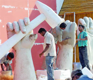 Artistes prepare Pragati Maidan for the India International Trade Fair- 2011 that starts on November 14. 