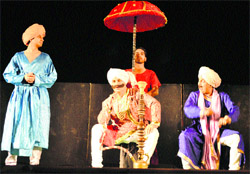 Artistes enact a scene from Bawa Jitto, directed by Balwant Thakur, at Jhiri Mela in Jammu