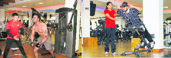 Youths exercise in gymnasiums with their instructors in Ludhiana
