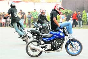 Bikers show stunts during a fete organised by Ehsas at Hansraj Public School in Panchkula on Saturday