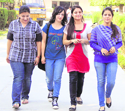 Casual shirts with trendy bags is the fashion mantra with college girls in Jalandhar. 