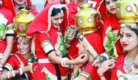 Participants at the All-India Mahatma Hansraj Aryan Youth Festival get ready for a Rajasthani folk dance at Police DAV Public School in Jalandhar on Saturday.