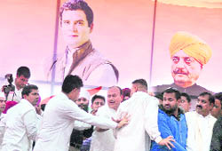 Ludhiana MP Manish Tiwari pushes zealous Congress supporters to clear the stage on Saturday. 