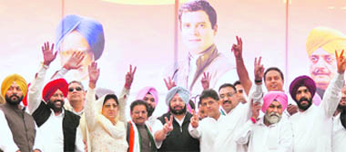 Capt Amarinder Singh, Rajinder Kaur Bhattal, Manish Tewari, GS Charak and other Congress leaders at the partys rally in Ludhiana on Saturday; (right below) gutkha sachets lie strewn near the rally venue in Samrala. 