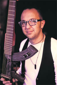 Cesar Lopez with his gun guitar