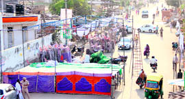 A busy road connecting Ladowali road to Chogatti chowk blocked to erect a stage on the eve of BJP's Jan Chetna Yatra.