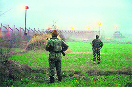 Floodlights along the international border between India and Pakistan on the Jammu frontier.