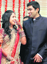 Ravichandran Ashwin with his bride Preethi during their reception in Chennai on Saturday. 
