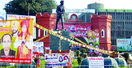 Strings of posters tied to the statue of martyr Udham Singh at Hall Gate in Amritsar.